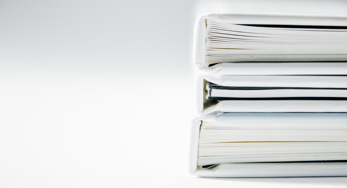 Rows of paper folders on a shelf